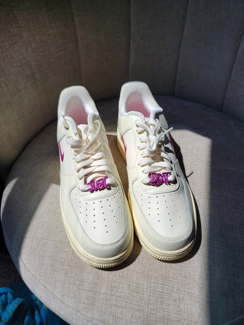 Nike Women’s Cream Sneakers with Pink Swoosh